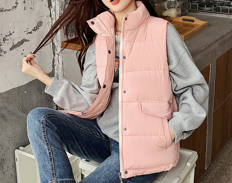 Naiste vabaajavest kõrge krae, taskute ja nööpidega