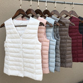 Laisva moteriška kelių spalvų liemenė su špico iškirpte