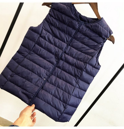 Laisva moteriška kelių spalvų liemenė su špico iškirpte