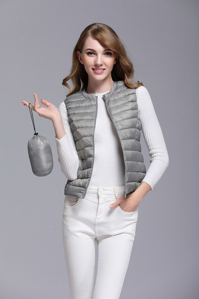 Moodne naiste vest luku ja ovaalse kaelusega