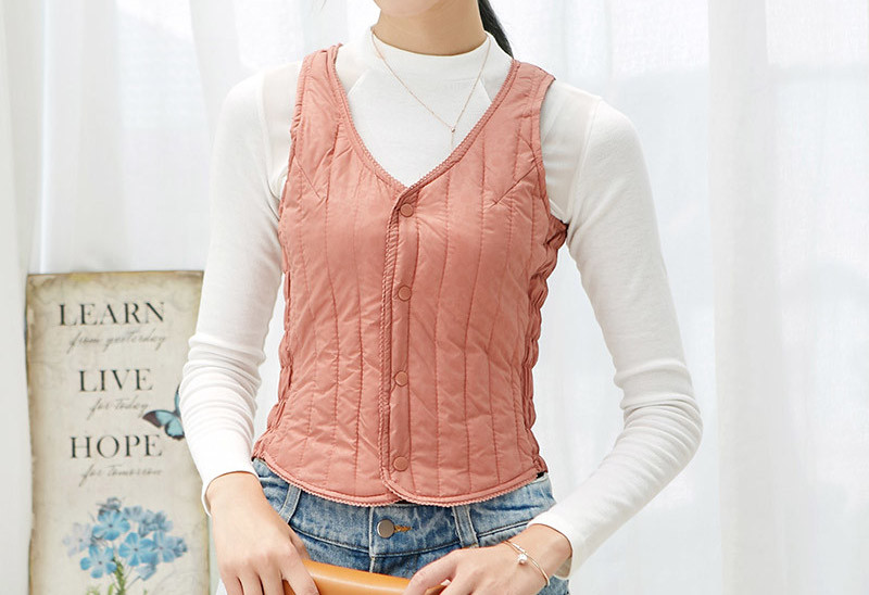 Naiste liibuv vest nööpide ja spitsikaelusega