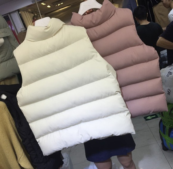 Dviejų modelių laisvalaikio moteriška liemenė aukšta apykakle