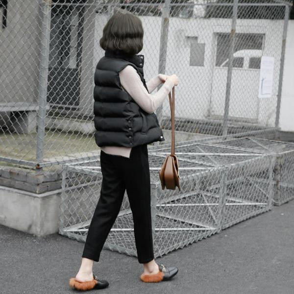 Tavalise pikkusega vabaaja naiste vest, must