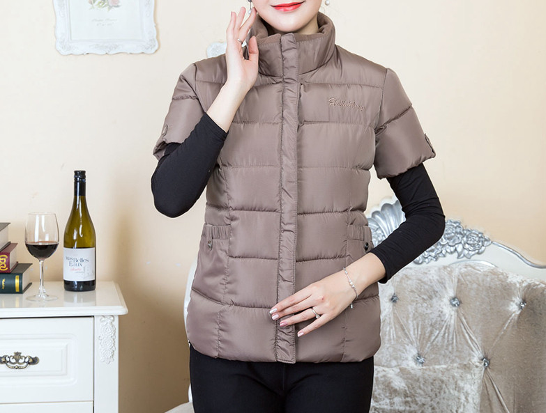 Naiste kõrge krae ja lühikeste varrukatega vest