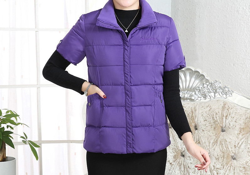 Naiste kõrge krae ja lühikeste varrukatega vest