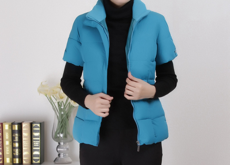 Naiste kõrge krae ja lühikeste varrukatega vest