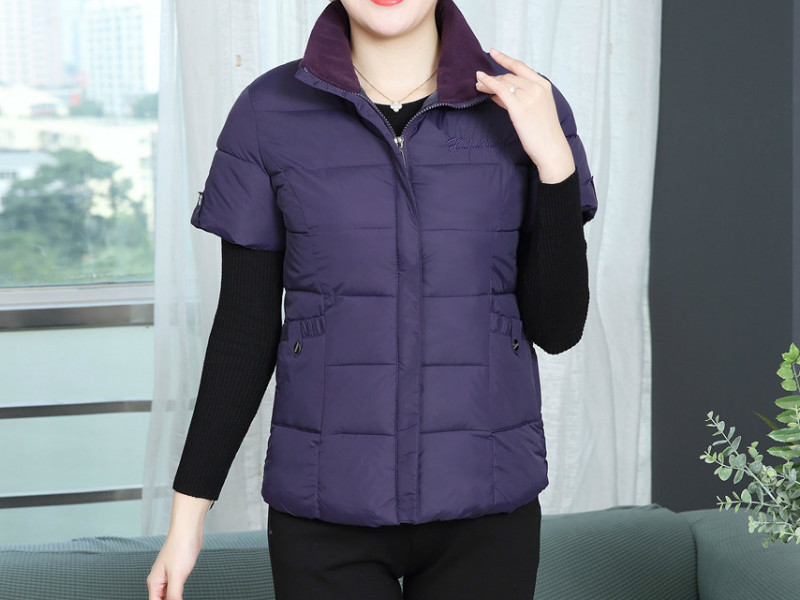 Naiste kõrge krae ja lühikeste varrukatega vest