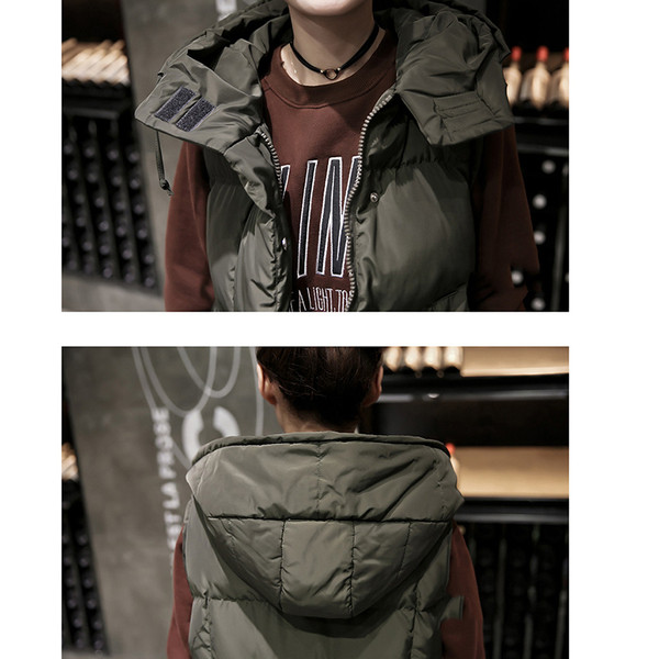 Široki model ženske sportske vestice s kapuljačom i džepovima