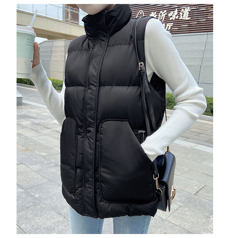 Tõmbluku ja nööpidega naistevest – kõrge kraega