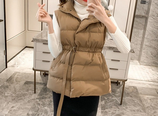 Sügis-talvine vest liibuva mudeliga elastse vöökohaga