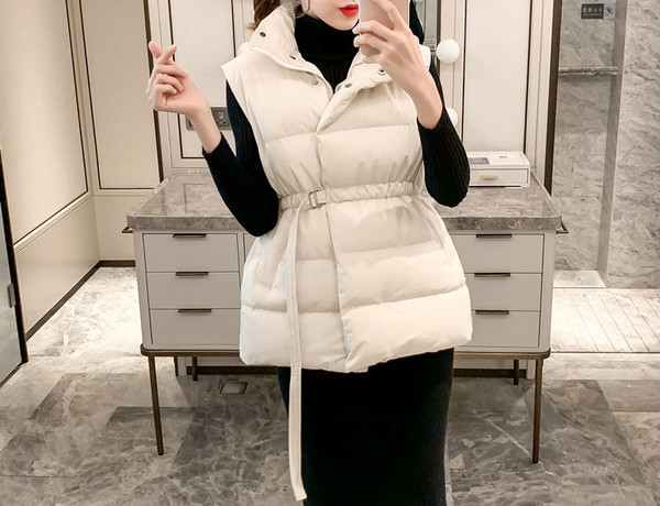 Sügis-talvine vest liibuva mudeliga elastse vöökohaga