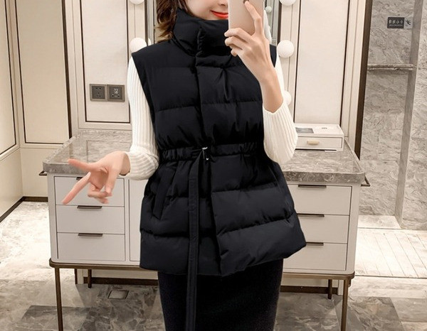 Sügis-talvine vest liibuva mudeliga elastse vöökohaga