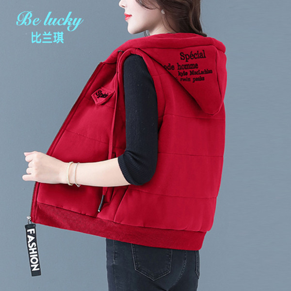 Laisva moteriška liemenė su gobtuvu ir vidutinio ilgio