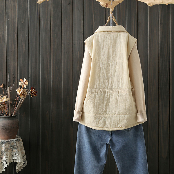 Laisvalaikiška moteriška liemenė su juosmens raiščiais ir užtrauktuku