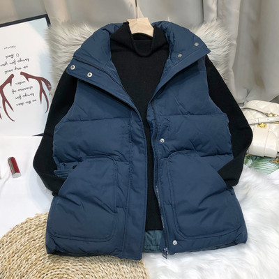 Nööpide ja kõrge kraega naiste vest