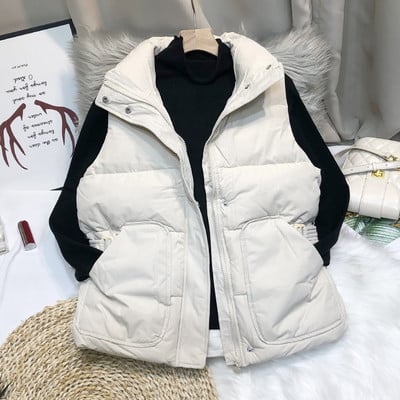 Nööpide ja kõrge kraega naiste vest