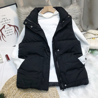 Nööpide ja kõrge kraega naiste vest