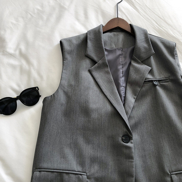 Naiste tekstiilist vest klassikalise kraega