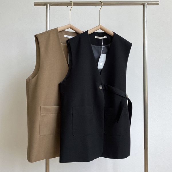 Naiste tekstiilist vabaajavest koos vööga