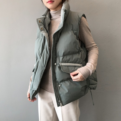 Naiste vabaaja vest nööpide ja kõrge vöökohaga