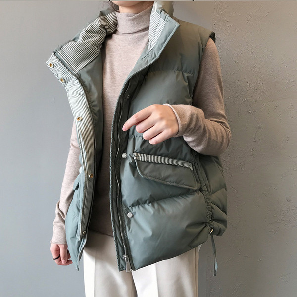 Naiste vabaaja vest nööpide ja kõrge vöökohaga