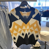 Värviline naiste kootud V-kaelusega vest