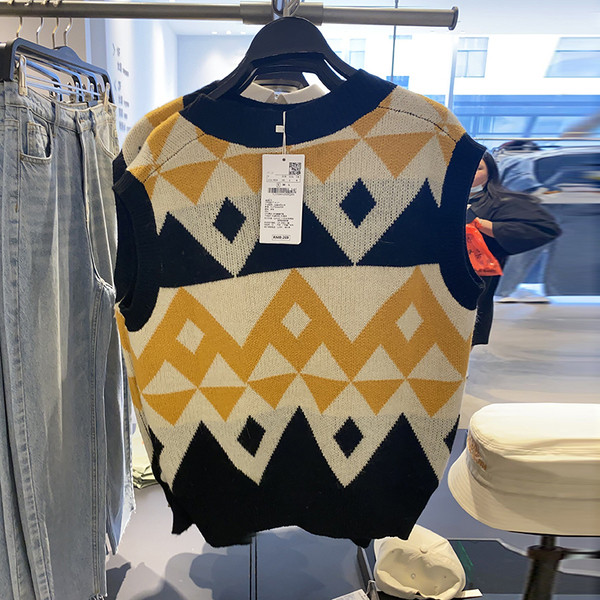 Värviline naiste kootud V-kaelusega vest