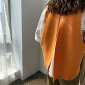 Sügisene naiste vest lõhikuga seljal