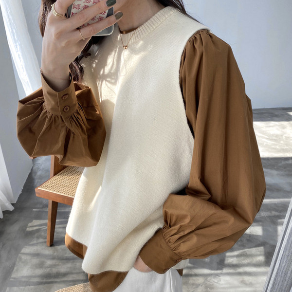 Sügisene naiste vest lõhikuga seljal