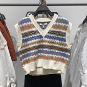 Naiste kootud vesti uus mudel mustri ja spitsikaelusega