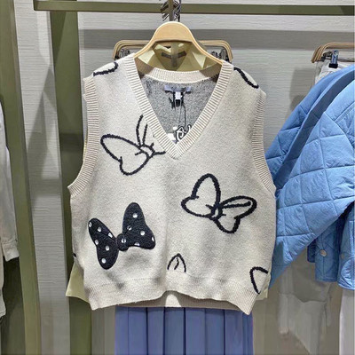 Naiste kootud vest spits-kaelusega beežis toonis