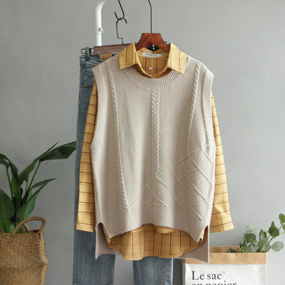 Asümmeetriline ümara kaelusega vest