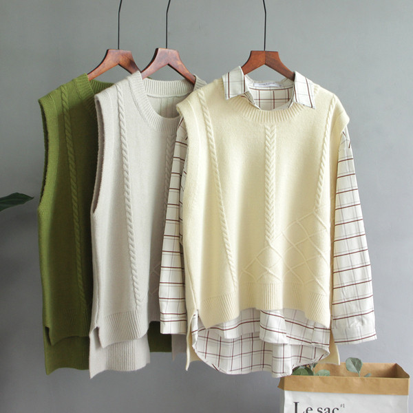 Asümmeetriline ümara kaelusega vest