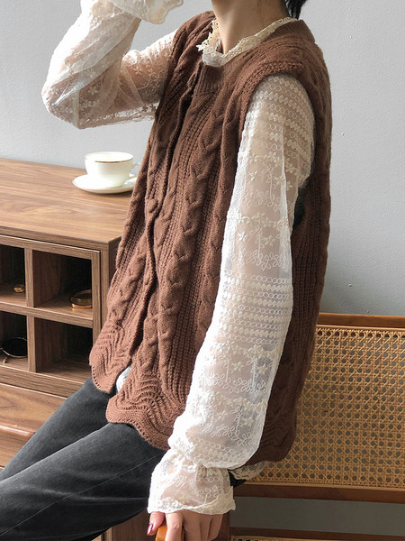 Naiste talvine kootud nööpidega vest