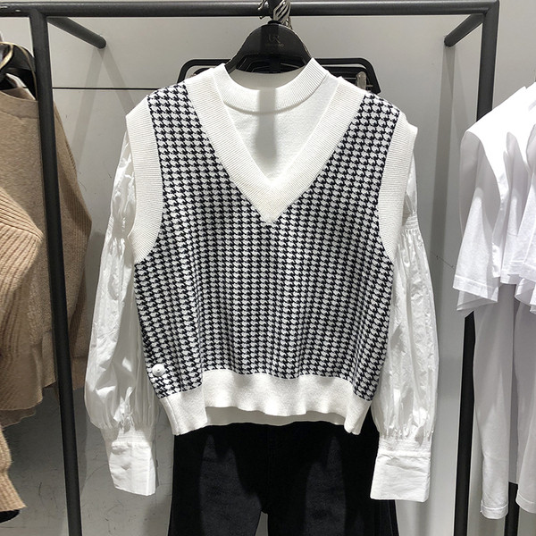 Moodne naiste mustvalge vest spits-kaelusega