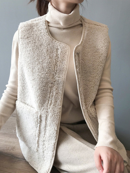 Naiste sulevest tasku ja spitsikaelusega