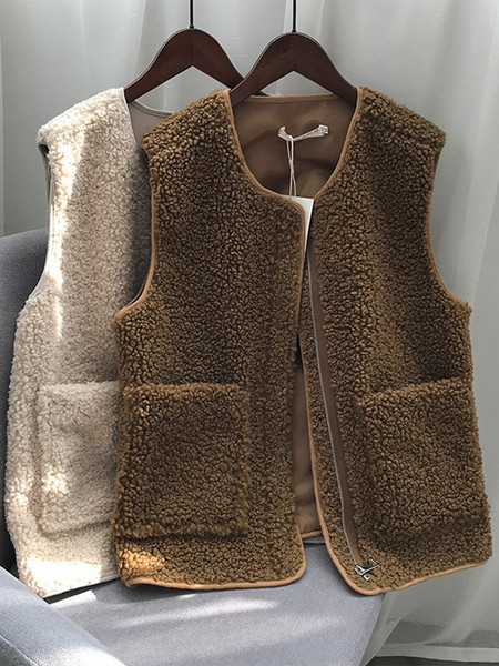 Naiste sulevest tasku ja spitsikaelusega