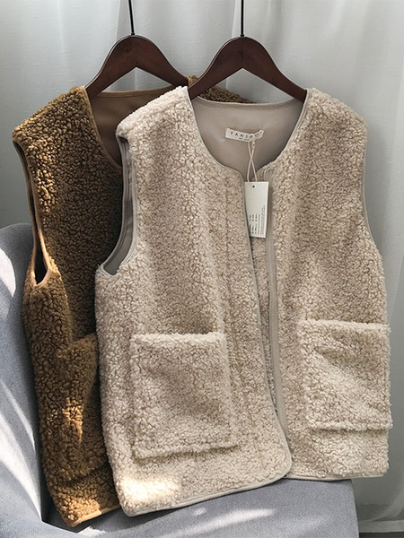 Naiste sulevest tasku ja spitsikaelusega