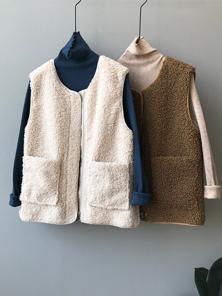 Naiste sulevest tasku ja spitsikaelusega