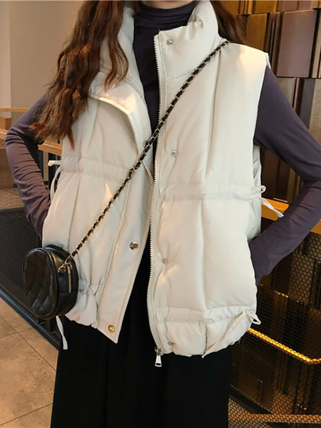 Naiste vabaajavest kõrge krae, taskute ja lipsudega