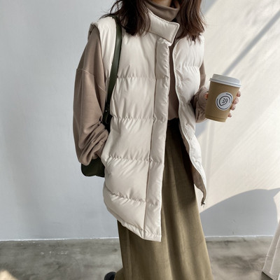 Naiste vest vöö ja kõrge kraega