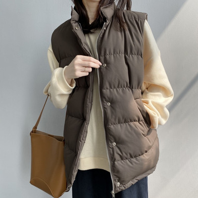 Naiste vest vöö ja kõrge kraega