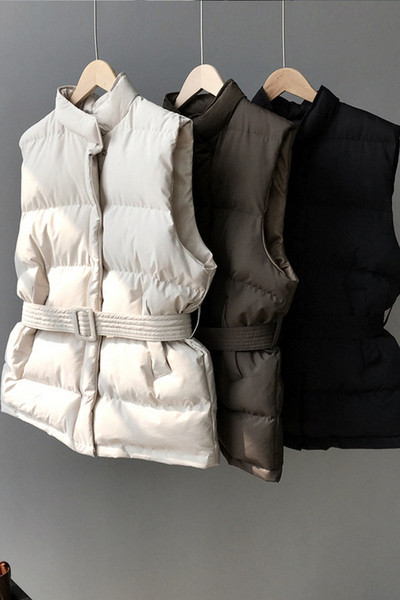 Naiste vest vöö ja kõrge kraega