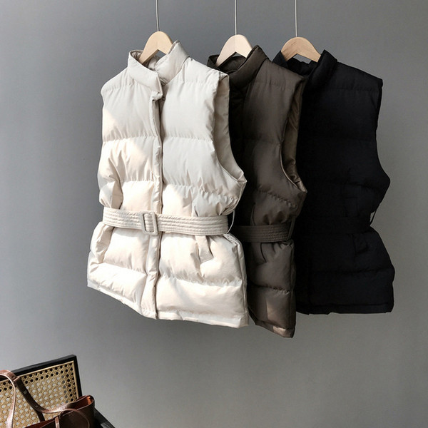 Naiste vest vöö ja kõrge kraega