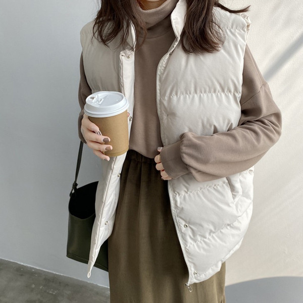 Naiste vest vöö ja kõrge kraega