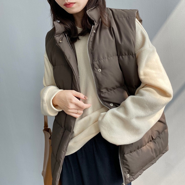 Naiste vest vöö ja kõrge kraega