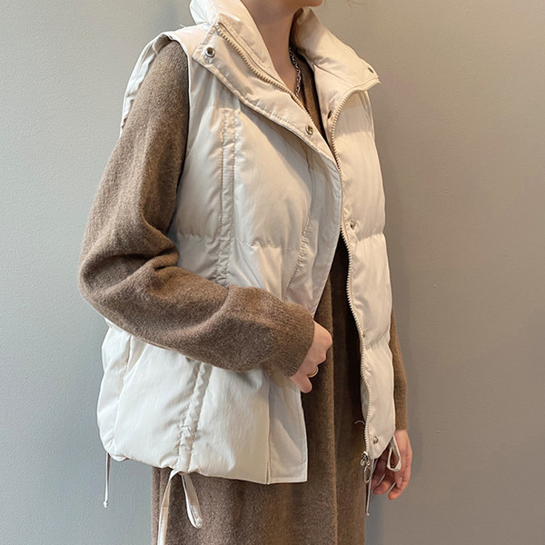 Igapäevane naiste vest koos kokkutõmmatud osadega