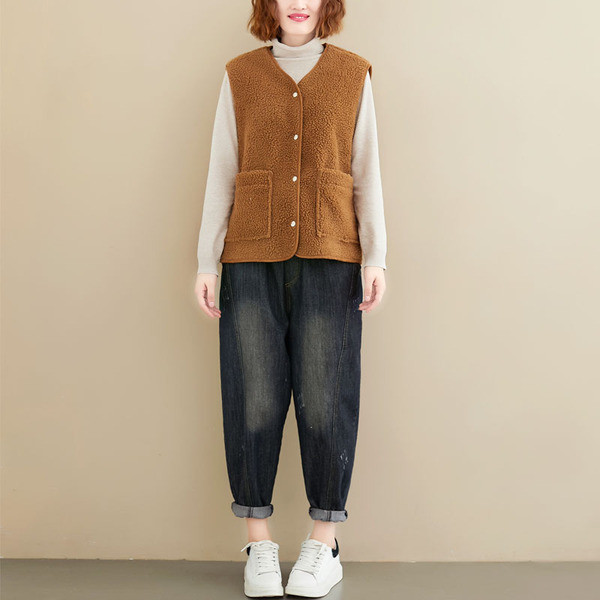 Uut mudelit spits-kaelusega taskutega naistevest