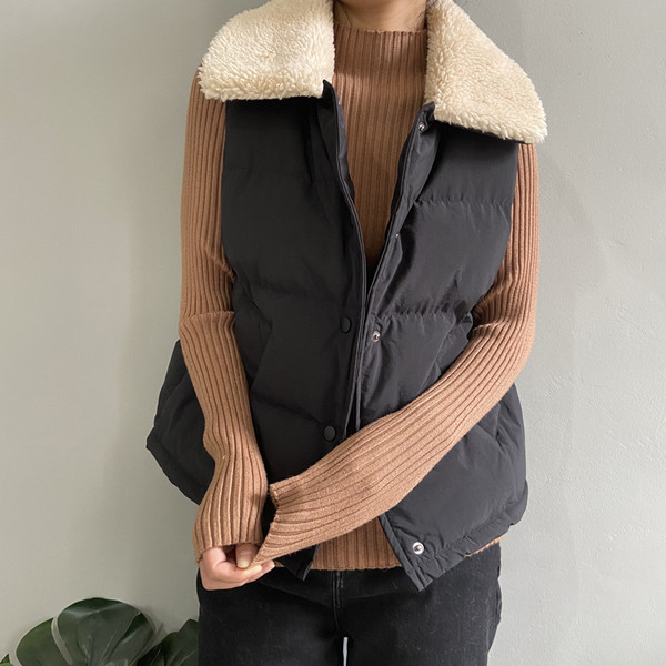 Sügis-talvine vest nööpide ja sulekraega