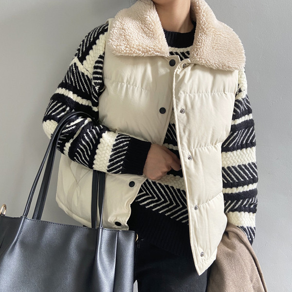 Sügis-talvine vest nööpide ja sulekraega